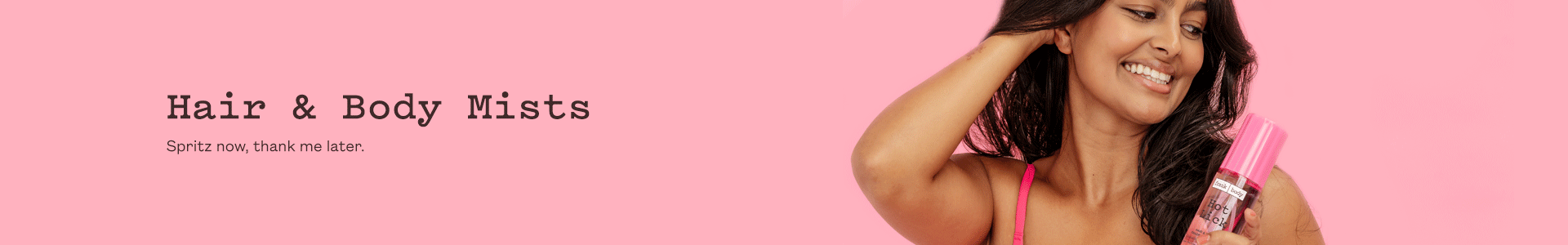 Hair & Body Mists collection banner. A smiling woman in a pink bikini top holding a bottle of frank body Hair & Body Fragrance Mist. Text reads: Hair & Body Mists. Spritz now, thank me later.