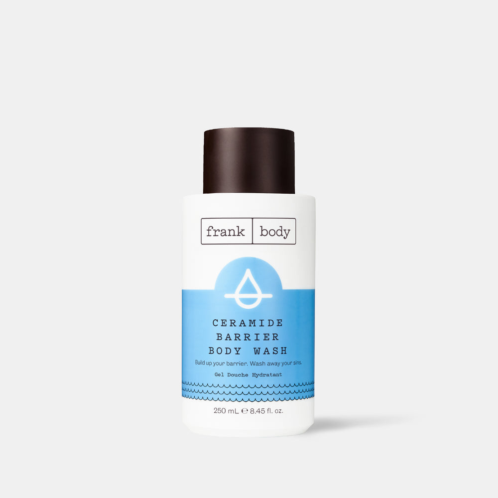 A white and blue bottle of frank body Ceramide Barrier Body Wash, 250ml.