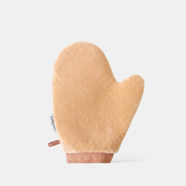A frank body Double Trouble Tanning Mitt.