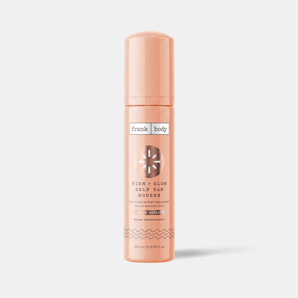 A 200ml bottle of frank body Firm + Glow Self Tan Mousse in Light.