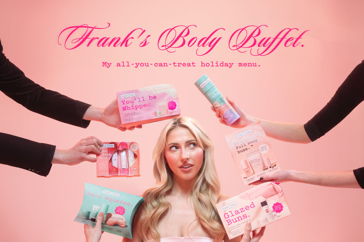 A promotional advertisement for Frank's Body Buffet featuring a blonde woman surrounded by multiple hands holding various pink and teal cosmetic gift boxes and bottles against a solid pink background with the text 'Frank's Body Buffet. My all-you-can-treat holiday menu.